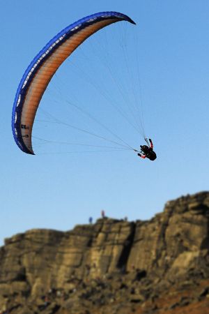 Paraglider above Stanage